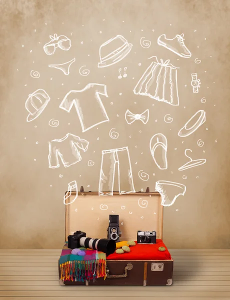 Traveler luggage with hand drawn clothes and icons — Stock Photo, Image