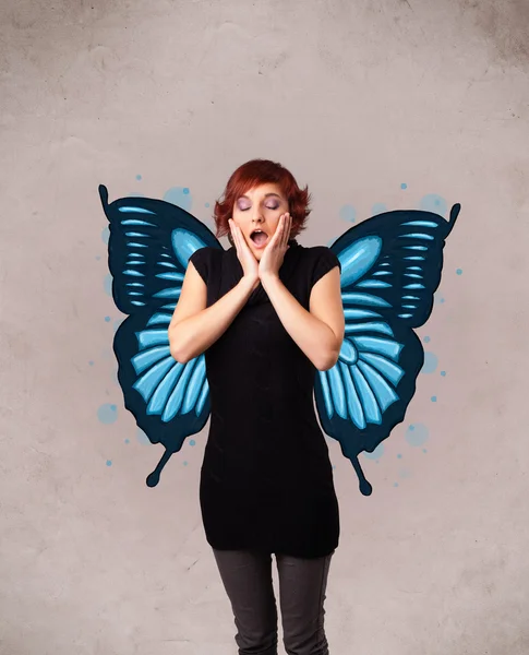 Young girl with butterfly blue illustration on the back — Stock Photo, Image