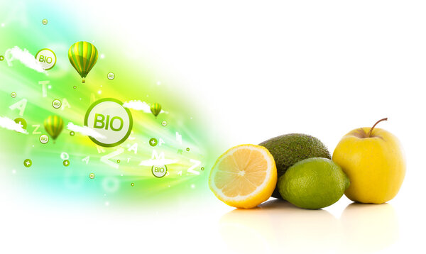 Colorful juicy fruits with green eco signs and icons