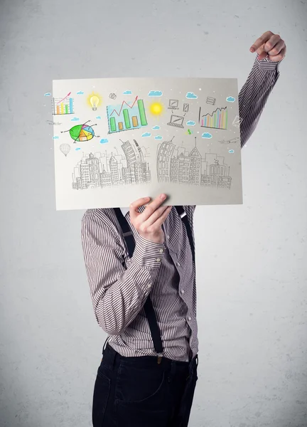 Geschäftsmann hält ein Blatt mit Schautafeln und Stadtbild vor sich. — Stockfoto