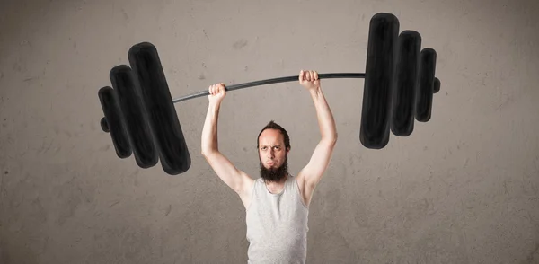 Lustiger dünner Kerl beim Heben von Gewichten — Stockfoto