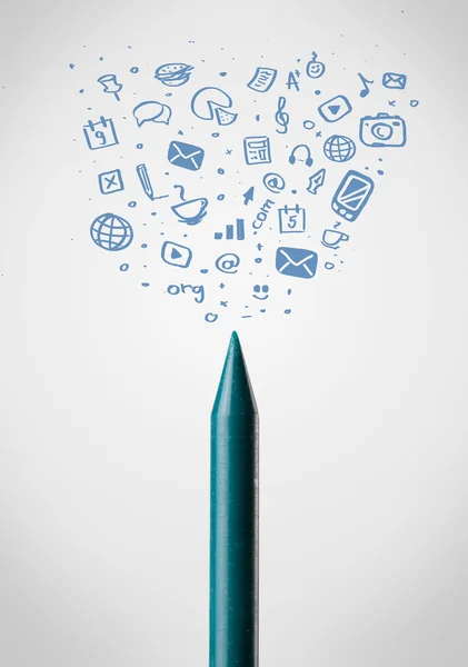 Crayon close-up with social media icons — Stock Photo, Image