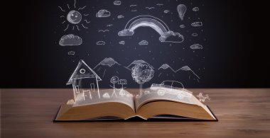Elle çizilmiş peyzaj ile açık kitap