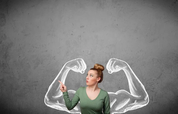 Young woman with strong muscled arms — Stock Photo, Image