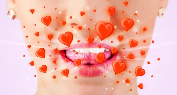 Pretty lady lips with lovely red hearts — Stock Photo, Image