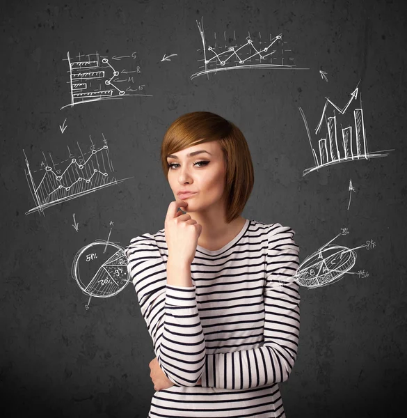 Young woman thinking with charts circulation around her head — Stock Photo, Image