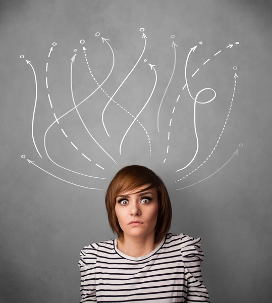 Young woman with arrows coming out of her head — Stock Photo, Image