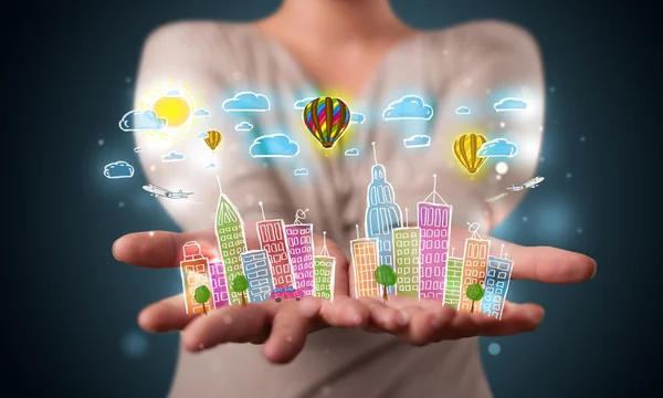 Young woman presenting colorful hand drawn metropolitan city — Stock Photo, Image