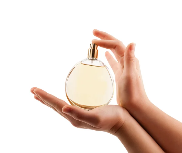 Női kéz permetező parfüm — Stock Fotó