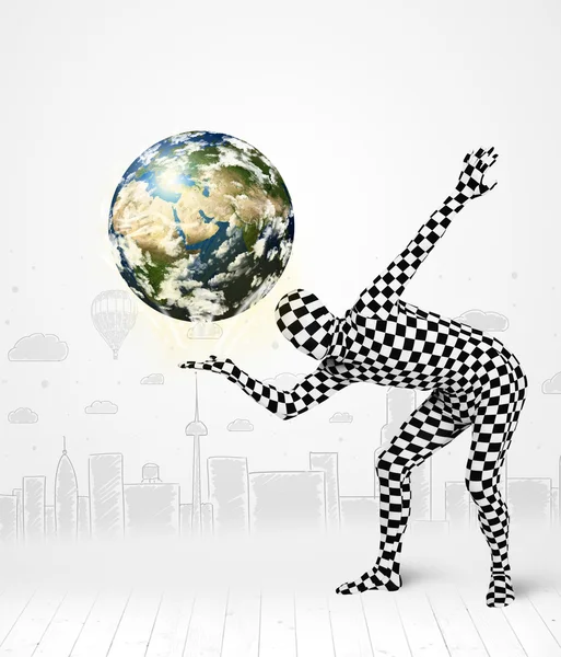 Man in full body suit holding planet earth — Stock Photo, Image