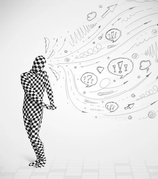 Guy in body suit morphsuit looking at sketches and doodles — Stock Photo, Image