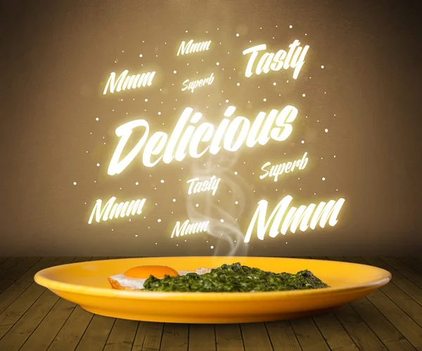 Food plate with delicious and tasty glowing writings — Stock Photo, Image