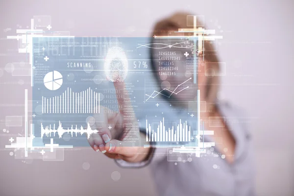 Young businesswoman pressing modern technology panel with finger — Stock Photo, Image