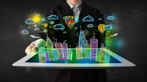 Young person showing tablet with hand drawn cityscape — Stock Photo, Image