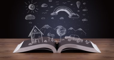 Elle çizilmiş peyzaj ile açık kitap