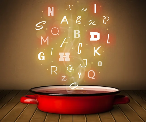 Світлі літери, що виходять з горщика для приготування їжі — стокове фото