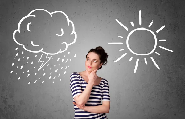 bir güneş ve yağmur çizme arasında duran kadın