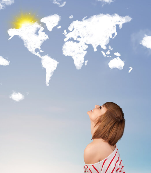 Young girl looking at world clouds and sun on blue sky
