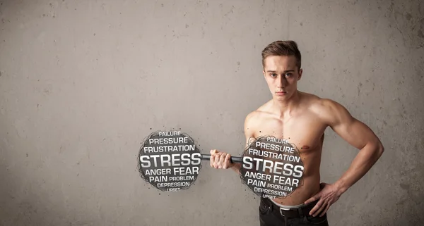 Muskulös man slåss med stress — Stockfoto