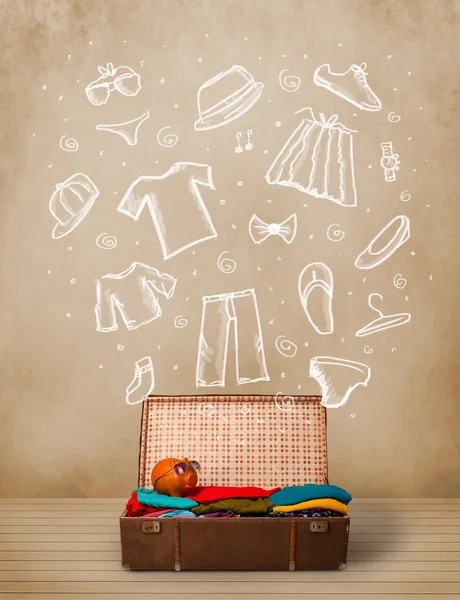 Reisegepäck mit handgezogener Kleidung und Symbolen — Stockfoto