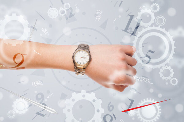 Hand with watch and numbers on the side comming out