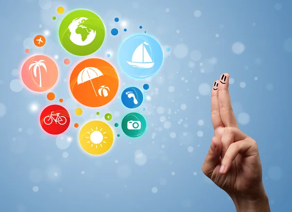 Cheerful finger smileys with colorful holiday travel bubble icon — Stock Photo, Image