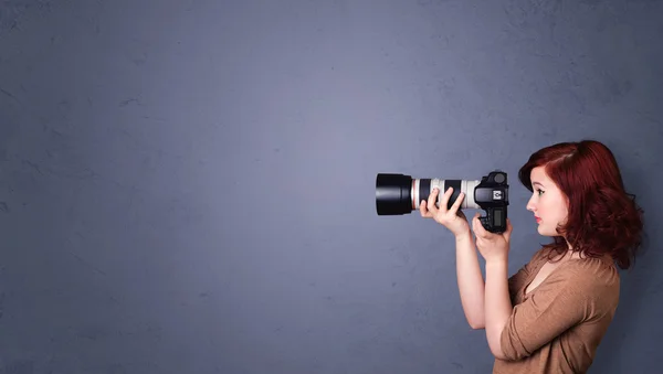 Photographer shooting images with copyspace area — Stock Photo, Image