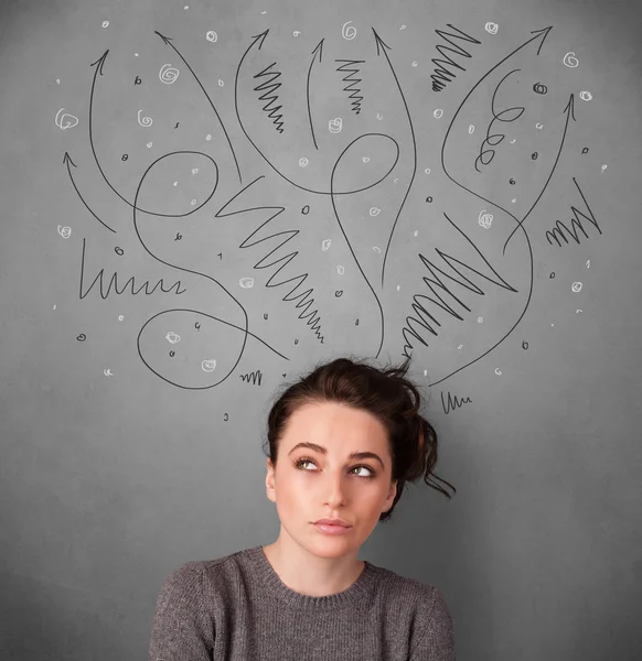 Young woman thinking with arrows over her head — Stock Photo, Image