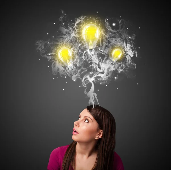 Thoughtful woman with smoke and lightbulbs above her head — Stock Photo, Image