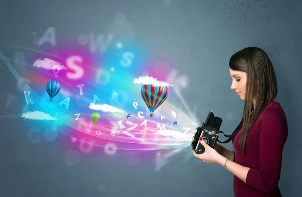 Photographer with camera and abstract imaginary — Stock Photo, Image