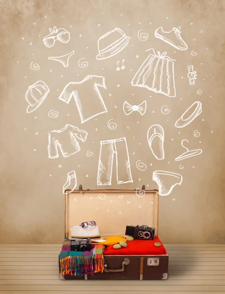 Traveler luggage with hand drawn clothes and icons — Stock Photo, Image