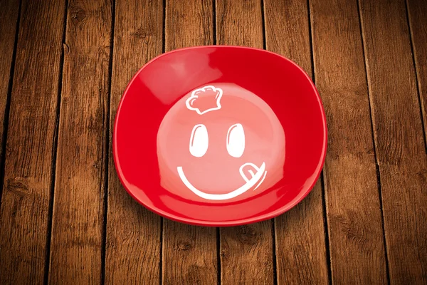 Happy smiley visage de dessin animé sur plaque de plat coloré — Photo