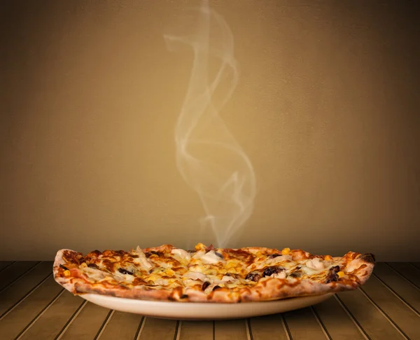 Fresh delicious home cooked pizza with steam — Stock Photo, Image