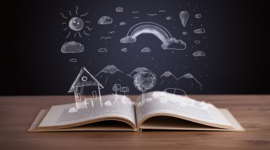 Elle çizilmiş peyzaj ile açık kitap 
