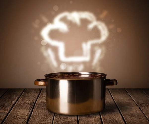 Chef hat above cooking pot — Stock Photo, Image