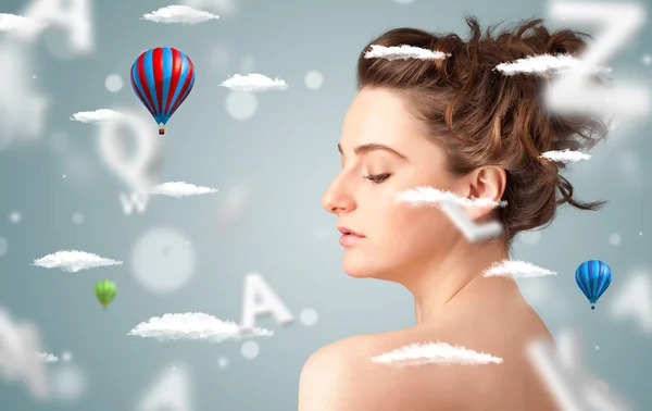 Beautiful young woman with wellness and healthcare clouds — Stock Photo, Image