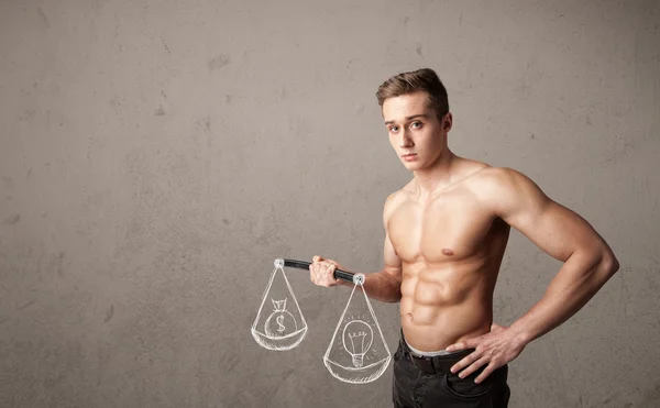 Hombre musculoso tratando de conseguir equilibrado — Foto de Stock