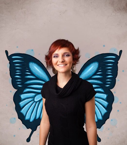 Young girl with butterfly blue illustration on the back — Stock Photo, Image