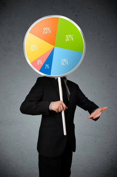 Üzletember kezében egy pite chart — Stock Fotó