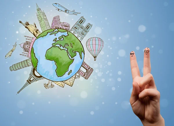 Cheerful finger smileys with famous landmarks of the globe — Stock Photo, Image