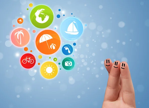 Cheerful finger smileys with colorful holiday travel bubble icon — Stock Photo, Image