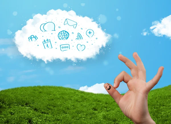 Happy smiley fingers looking at cloud with blue social icons and — Stock Photo, Image