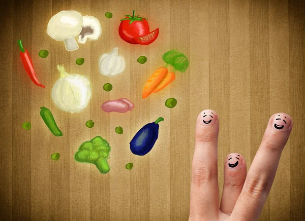 Happy smiley face fingers looking at illustration of colorful he — Stock Photo, Image