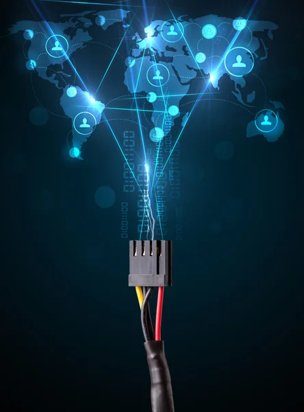 Iconos de redes sociales que salen del cable eléctrico — Foto de Stock