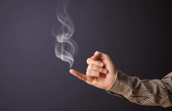 Pistola en forma de mano de hombre —  Fotos de Stock