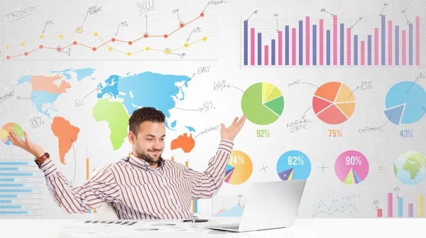 Business man with colorful charts — Stock Photo, Image