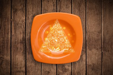 Renkli tabak üzerinde elle çizilmiş yemek piramidi