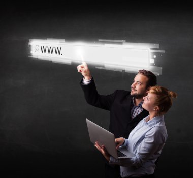 Young business couple touching web browser address bar with www  clipart