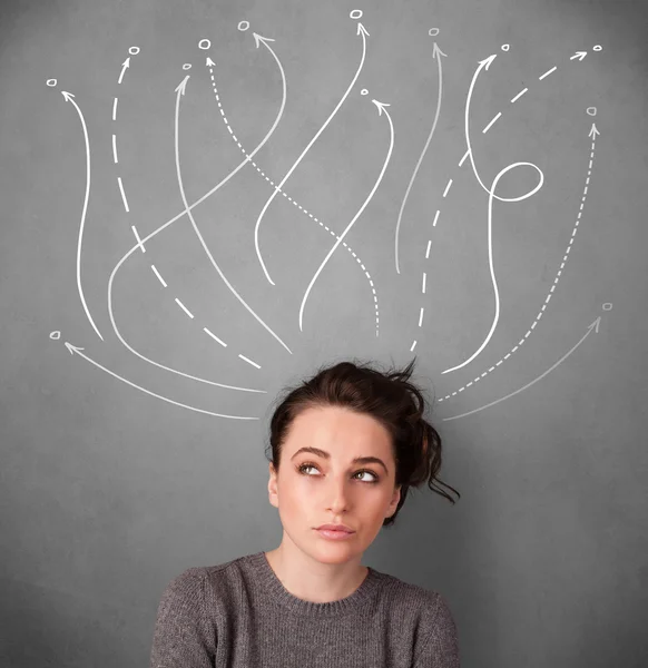 Young woman with arrows coming out of her head — Stock Photo, Image