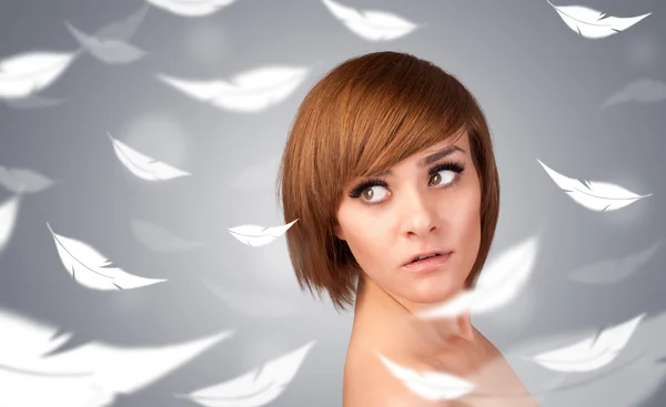 Beautifull young girl with light feather skin concept — Stock Photo, Image